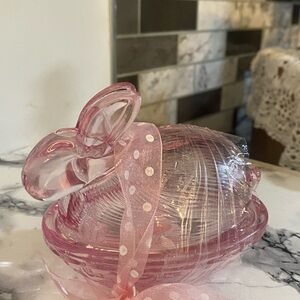 Pink bunny on a nest